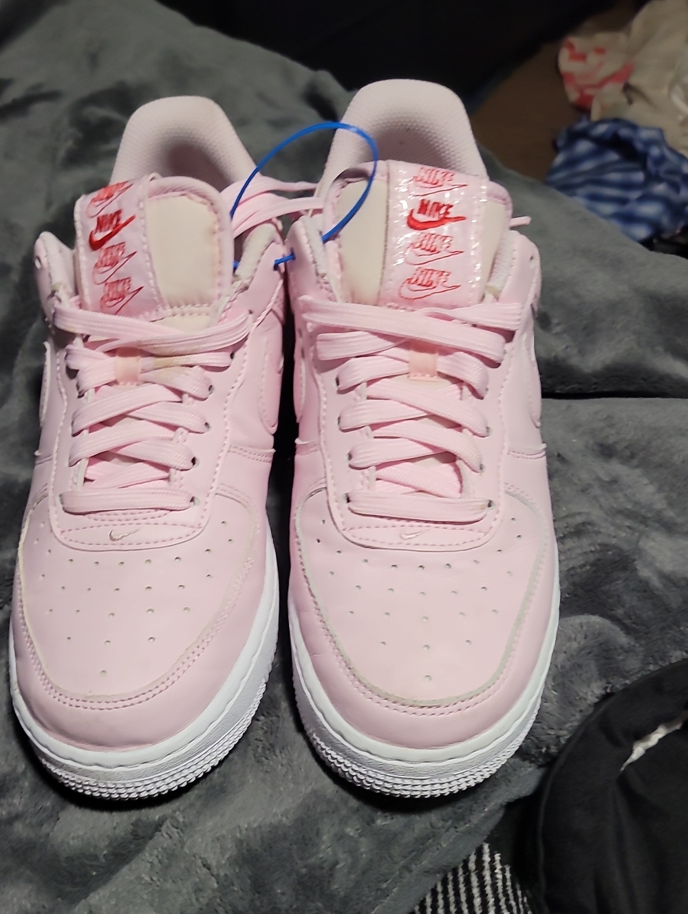 Nike Women’s Light Pink Low-Top Sneakers with White Sole